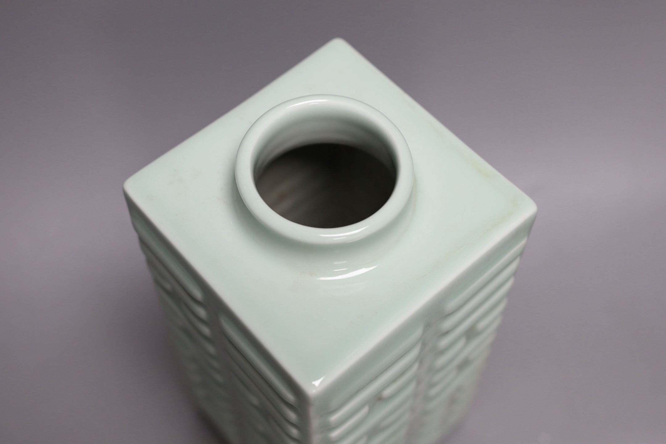 A Chinese celadon glazed cong form vase, Guangxu mark, 27cms high